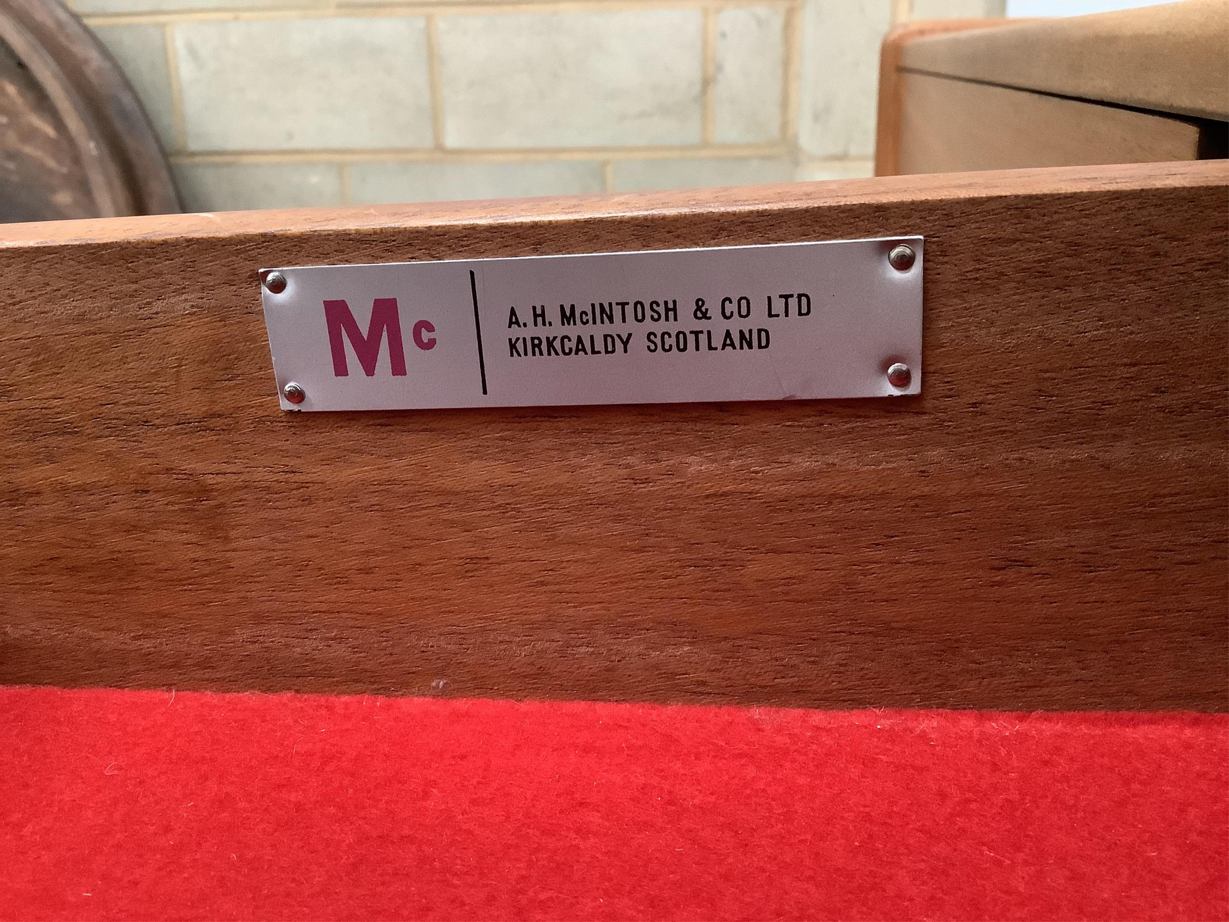 A mid century Danish style MacIntosh Forfar teak sideboard, width 170cm, depth 46cm, height 102cm together with a McIntosh teak extending dining table and four chairs teak sideboard, width 170cm, depth 46cm, height 102cm